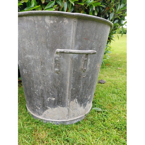 1116 - Pair of early 20th C. galvanised planters {39 cm H x 43 cm Dia.}.