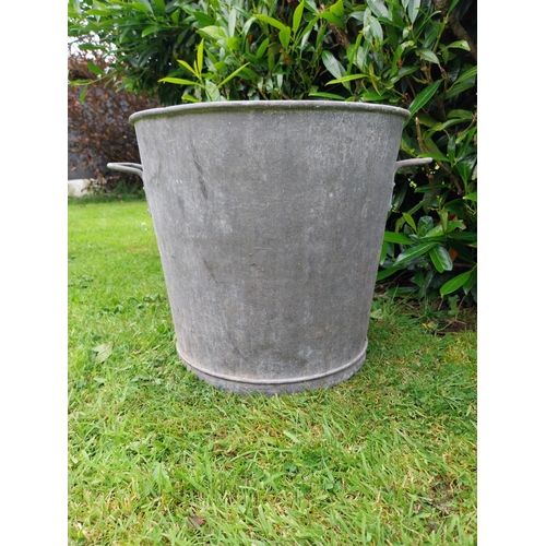 1116 - Pair of early 20th C. galvanised planters {39 cm H x 43 cm Dia.}.