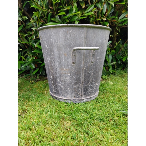 1116 - Pair of early 20th C. galvanised planters {39 cm H x 43 cm Dia.}.