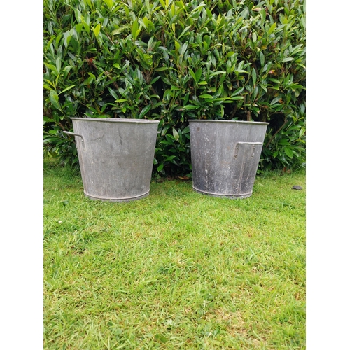 1116 - Pair of early 20th C. galvanised planters {39 cm H x 43 cm Dia.}.