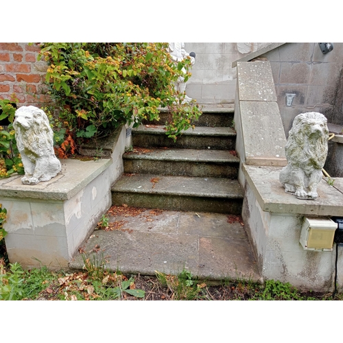 1214 - Pair of composition stone statues of seated Lions {H 52cm x W 26cm x D 34cm }. NOT AVAILABLE TO VIEW... 