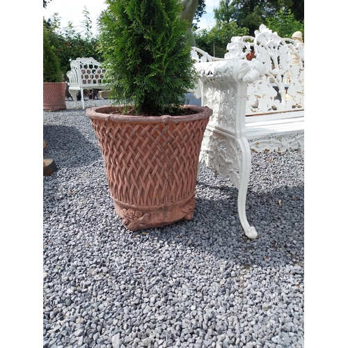 1305 - Pair of moulded terracotta lattice planters {143 cm H - including and Planter 50 cm H x 55 cm Dia.}.