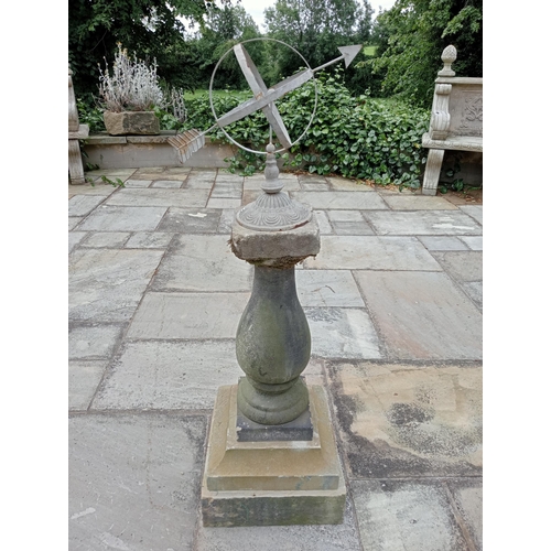 1313 - Galvanised metal armorial sundial raised on Yorkshire stone pedestal NOT AVAILABLE TO VIEW IN PERSON