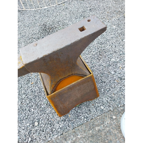 1320 - Large Anvil mounted on stand {75 cm H x 84 cm W x 36 cm D}.