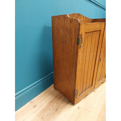 356 - Edwardian oak wall hanging office cabinet with fitted interior. {73 cm H x 58 cm W  x 29 cm D}
