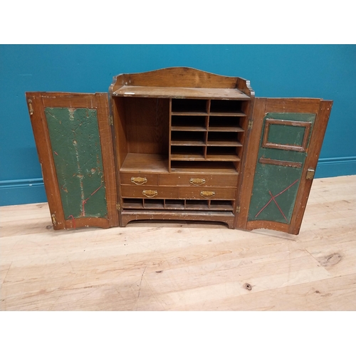356 - Edwardian oak wall hanging office cabinet with fitted interior. {73 cm H x 58 cm W  x 29 cm D}