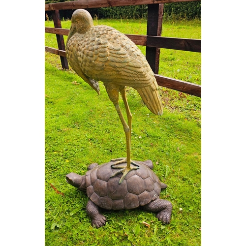 1327 - Good quality bronze sculpture of a Heron mounted on a Tortoise {104 cm H x 50 cm W x 66 cm D}.