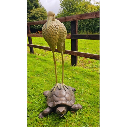 1327 - Good quality bronze sculpture of a Heron mounted on a Tortoise {104 cm H x 50 cm W x 66 cm D}.