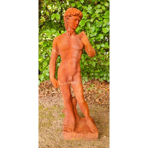 1329 - Heavy cast iron statue of David {84 cm H x 31 cm W x 22 cm D}.