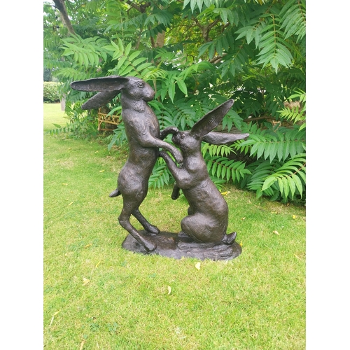 1334 - Exceptional quality bronze sculpture of Hares at Play {78 cm H x 40 cm W  x 82 cm D}.