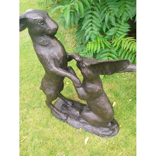 1334 - Exceptional quality bronze sculpture of Hares at Play {78 cm H x 40 cm W  x 82 cm D}.