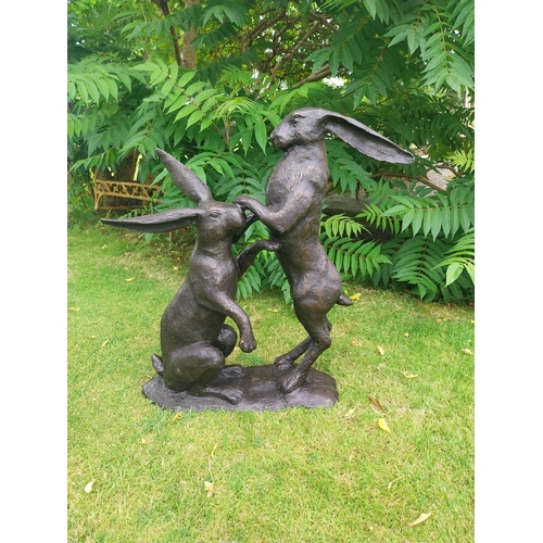 1334 - Exceptional quality bronze sculpture of Hares at Play {78 cm H x 40 cm W  x 82 cm D}.