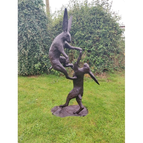 1337 - Exceptional quality bronze sculpture of Fighting Hares {160 cm H x 32 cm W  x 30 cm D}.