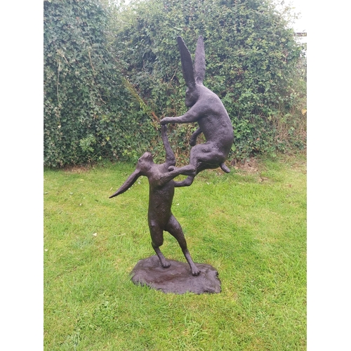 1337 - Exceptional quality bronze sculpture of Fighting Hares {160 cm H x 32 cm W  x 30 cm D}.