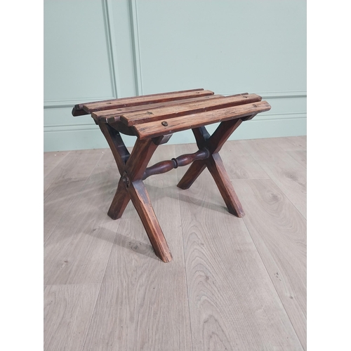 134 - Rare early 20th C. oak fishing stool {36 cm H x 44 cm W x 33 cm D}.