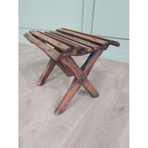 134 - Rare early 20th C. oak fishing stool {36 cm H x 44 cm W x 33 cm D}.