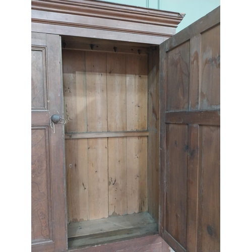 144 - 19th C. Irish scumbled pine kitchen cupboard with two panelled doors over two short drawers {206 cm ... 