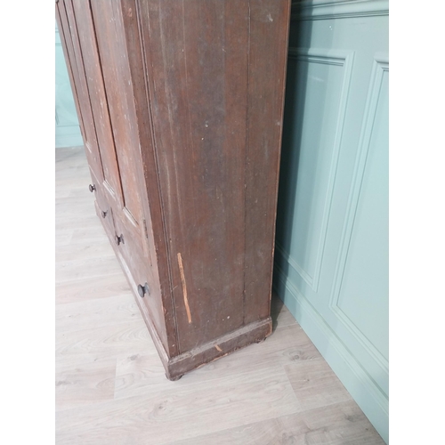 144 - 19th C. Irish scumbled pine kitchen cupboard with two panelled doors over two short drawers {206 cm ... 