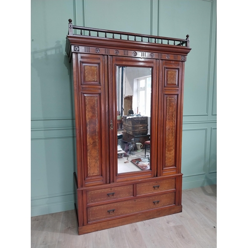 16 - Edwardian walnut wardrobe with mirrored door {235 cm H x 152 cm W x 60 cm D}.