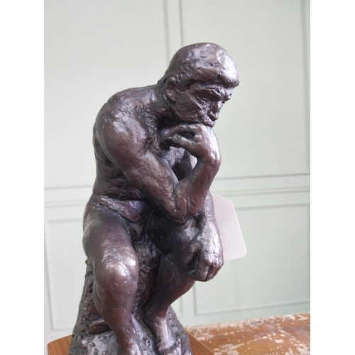 227 - Resin bronze figure of the Thinking Man {29 cm H x 12 cm W x 14 cm D}.