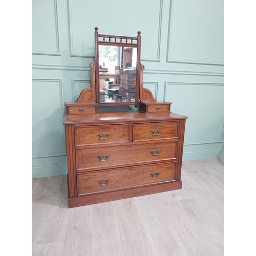 23 - Edwardian walnut washstand with mirrored back and two short drawers over the long drawers {136 cm H ... 