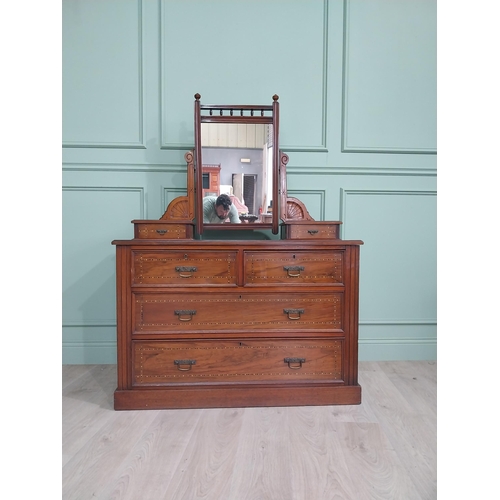 23 - Edwardian walnut washstand with mirrored back and two short drawers over the long drawers {136 cm H ... 