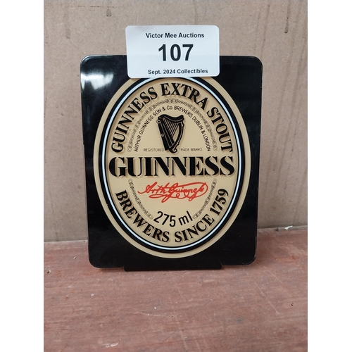 107 - Guinness perspex advertising sign. {16 cm H x 13 cm W}