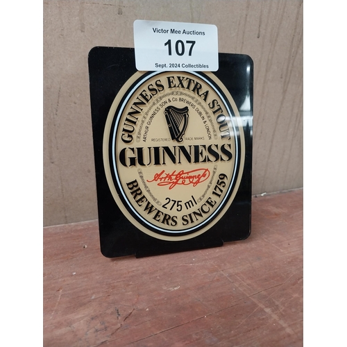 107 - Guinness perspex advertising sign. {16 cm H x 13 cm W}