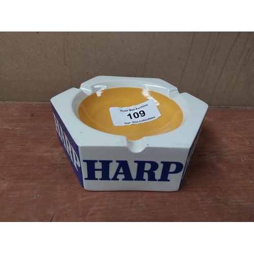 109 - Harp Keg ceramic ashtray. {18cm W}.