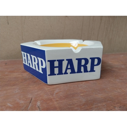 109 - Harp Keg ceramic ashtray. {18cm W}.