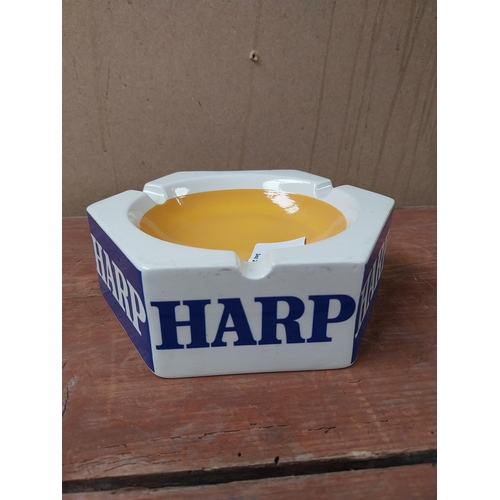 109 - Harp Keg ceramic ashtray. {18cm W}.