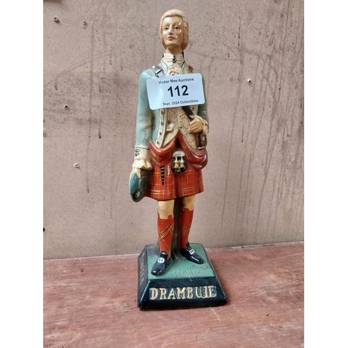 112 - Drambuie rubberoid advertising figure. {34 cm H x 11 cm W x 11 cm D}.