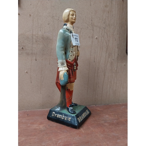 112 - Drambuie rubberoid advertising figure. {34 cm H x 11 cm W x 11 cm D}.