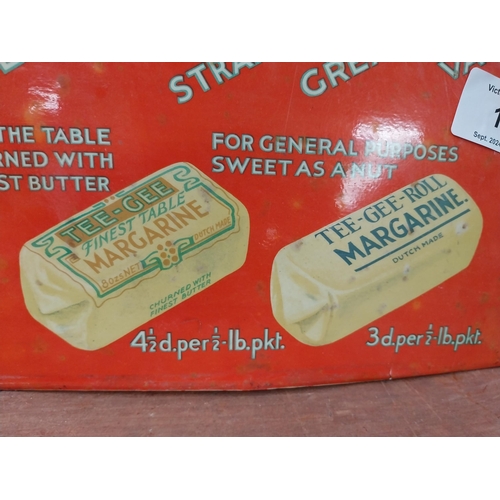 113 - Tee Gee Margarine celluloid advertisement. {23 cm H x 32 cm W}.