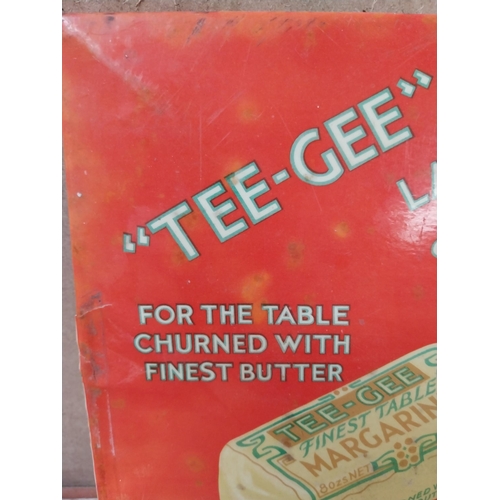 113 - Tee Gee Margarine celluloid advertisement. {23 cm H x 32 cm W}.