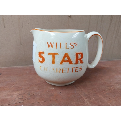 114 - Wills's Star Cigarettes ceramic advertising jug. {10 cm H x 15 cm W x 10 cm D}.