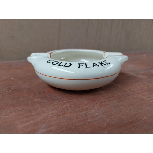 116 - Wills's Gold Flake ceramic ashtray. {2 cm H x 12 cm W  x 10 cm D}.