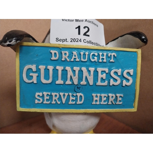 12 - Guinness advertising model of Penguin. {22 cm H x 16 cm W x 9 cm D}.