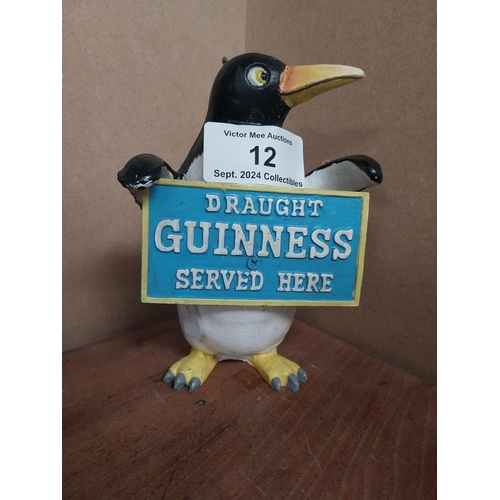 12 - Guinness advertising model of Penguin. {22 cm H x 16 cm W x 9 cm D}.