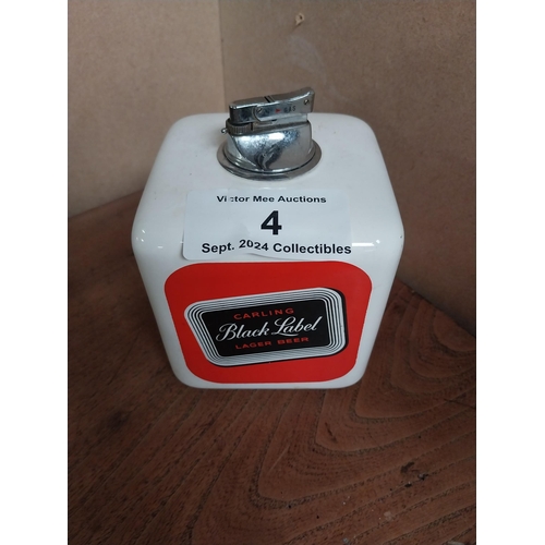 4 - Carling Black Label Wade ceramic cigarette lighter. {15cm H X 11cm Dia}.