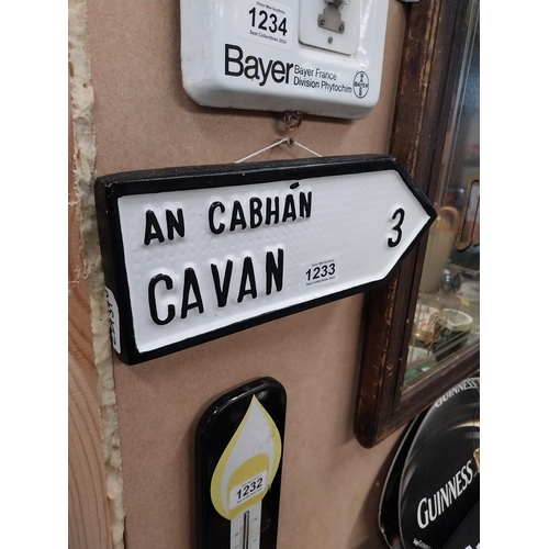 1233 - Cavan composition wall sign. {10 cm H x 27 cm W}.