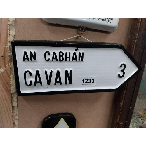 1233 - Cavan composition wall sign. {10 cm H x 27 cm W}.