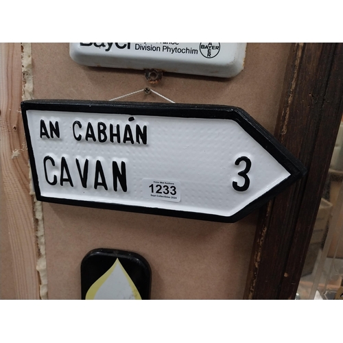 1233 - Cavan composition wall sign. {10 cm H x 27 cm W}.