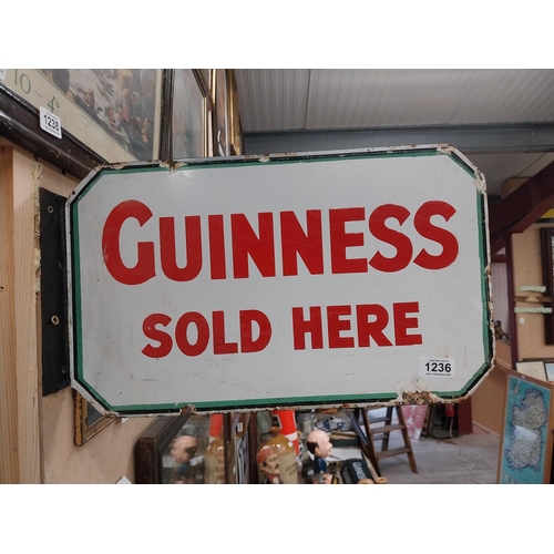 1236 - Guinness sold here double sided enamel bracket advertising sign. {28 cm Hx  46 cm W}.