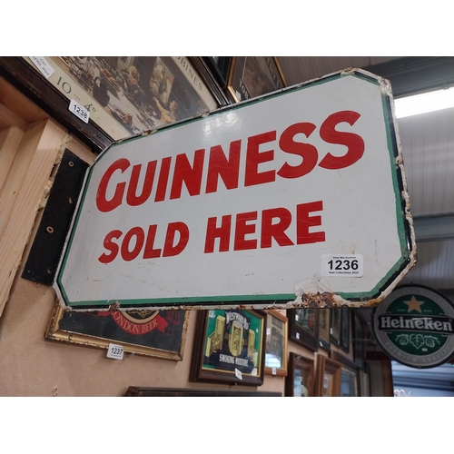 1236 - Guinness sold here double sided enamel bracket advertising sign. {28 cm Hx  46 cm W}.