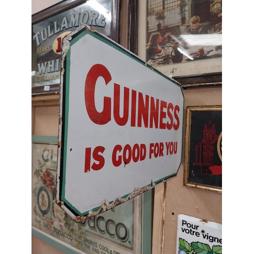 1236 - Guinness sold here double sided enamel bracket advertising sign. {28 cm Hx  46 cm W}.