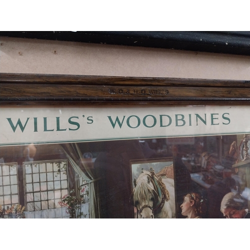 1238 - Original Wills's Woodbine framed showcard in original frame. {32 cm H x 57 cm W].