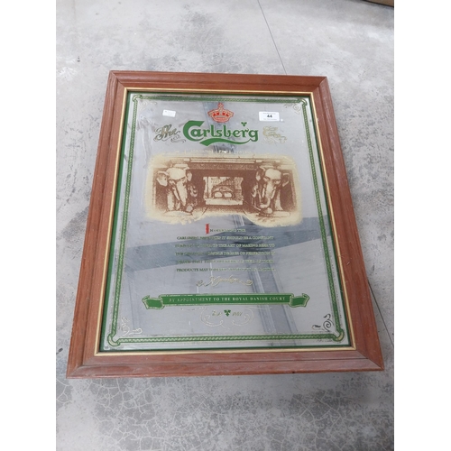 44 - Framed Carlsberg advertising mirror.{91 cm H x 71 cm W}.