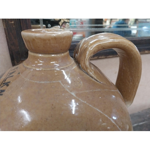 1248 - 19th C. Stoneware flagon Francis Faulkner Wine and Spirit Merchant Dublin and London with damage. {3... 