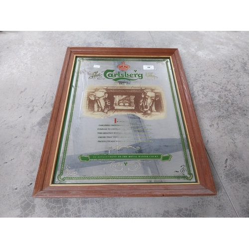 44 - Framed Carlsberg advertising mirror.{91 cm H x 71 cm W}.